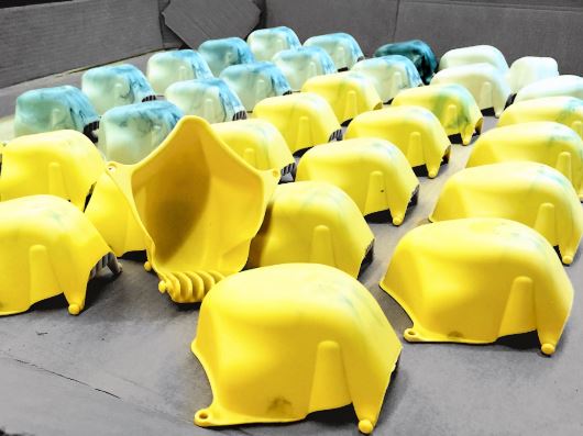 Yellow Mask Injection Molded Part